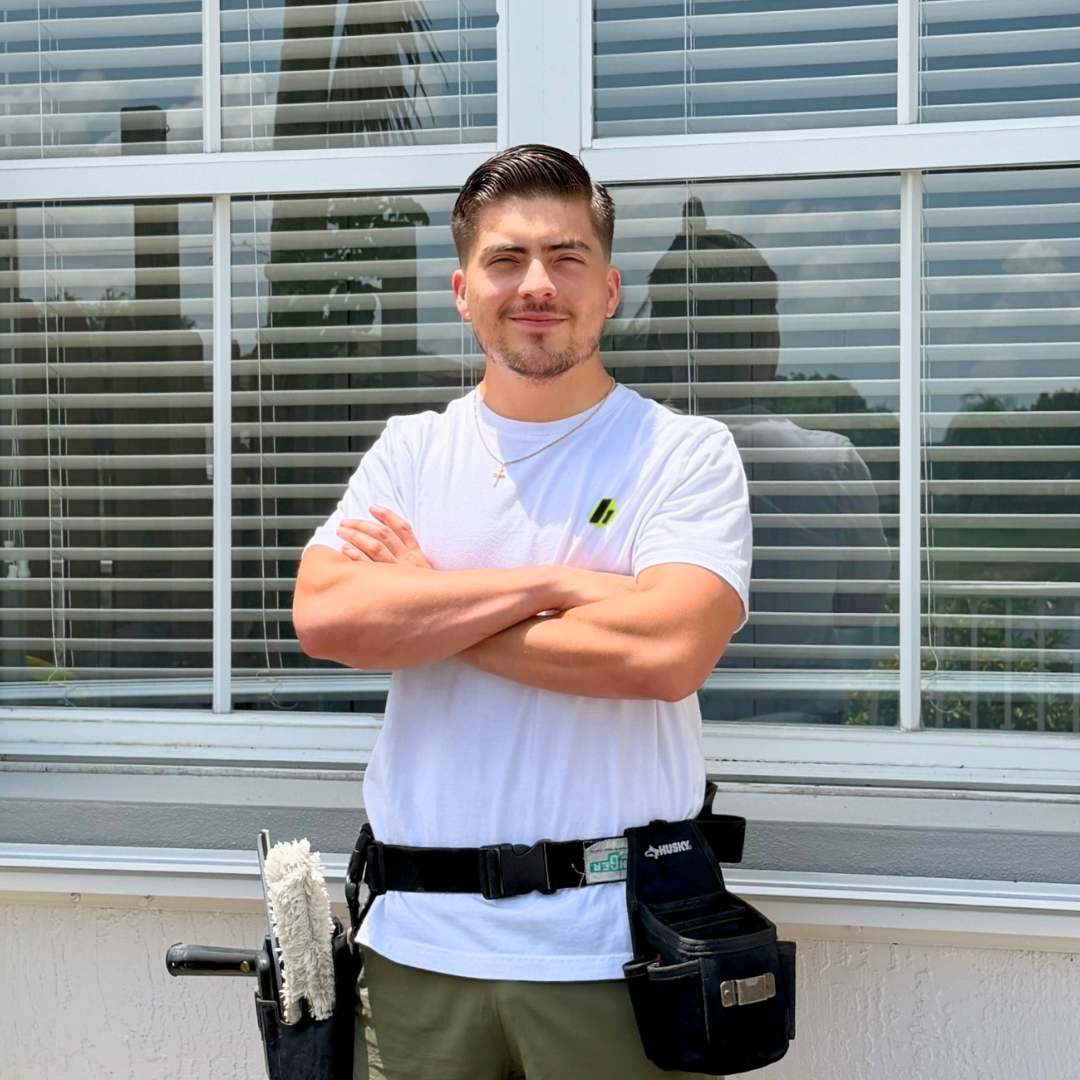Cesar from Glassy Window Cleaning ready to clean your Doral home's windows